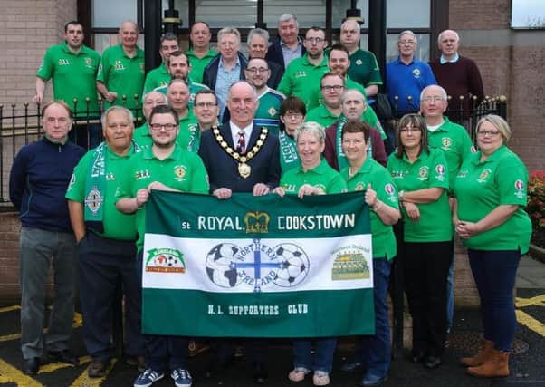Cookstown Northern Ireland Supporters Club celebrate 35 years of following club around the world with a reception hosted at Mid Ulster District Council