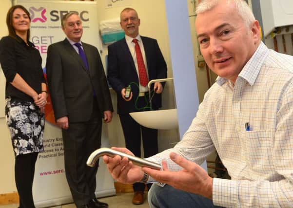 Elaine Flynn, SERC Commercial Contracts Manager, SERC principal Ken Webb, tutor Paul Henry and George McCracken Head of Estates Risk and Environment, Belfast Health and Social Care Trust.