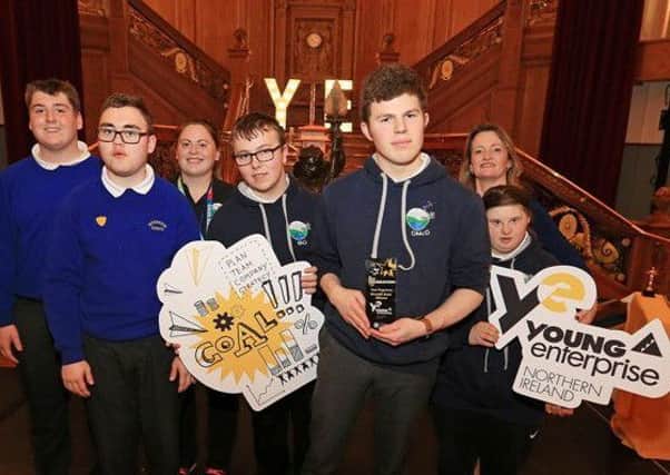 Overall Team Programme winners for the North East area, Boom from Riverside School pictured with Carol Fitzsimons MBE, Chief Executive Young Enterprise.