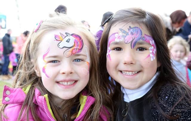 Eva-Grace Patterson and Lily Callaghan with their faces painted at the Ballymoney Spring Fair. Picture by Darren Kidd / Press Eye.  INBM 18-701-CON