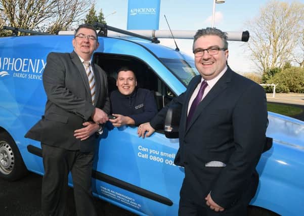 Michael Jeffers (28), has been appointed as a full-time trainee Gas Service Engineer with Phoenix Energy Services, having successfully completed a gas engineering apprenticeship with the company.  Pictured handing over keys to his new vehicle is Paul McKee (R), General Manager, and Duncan Whelan (L), Operations Manager.