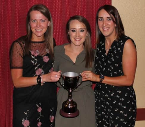 Sarah Winslow, Lynda Elliott and Lynsey Purdy with the Chairpersons Cup awarded for their contribution to the Junior club.