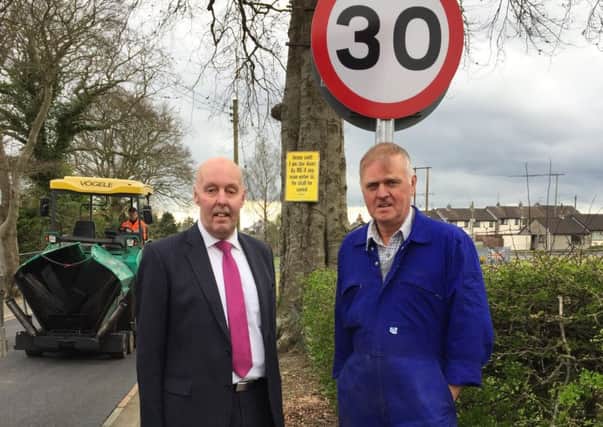 DUP Alderman Junior McCrum (left) has welcomed a new 30 mph speed limit now in force in Moneyslane. For a number of years Alderman McCrum and retired DUP Councillor David Herron (right) have been campaigning for the speed restriction in response to concerns raised by local residents.