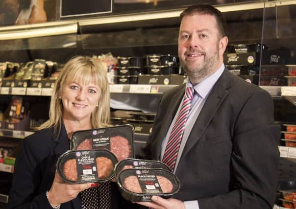 Caoimhe Mannion, Marketing Manager of Tesco NI and Alan McKeown, Commercial Sales Manager at Doherty & Gray.