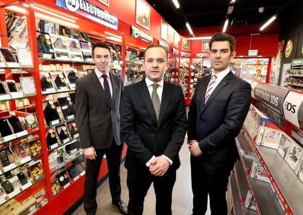 Pictured in Cookstowns new CeX store are, from left, Lambert Smith Hamptons Retail team Tony Kernan, Gary Martin and Ryan Kee