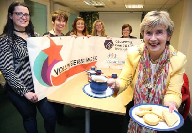 The Mayor of Causeway Coast and Glens Borough Council, Alderman Maura Hickey, helps to launch the Volunteers Week Vintage Tea Parties with Ruth McNeill from Causeway Volunteer Centre, Mary McNickle from Causeway Volunteer Centre, Ashleen Schenning from Limavady Volunteer Centre and Catherine Farrimond from Causeway Coast and Glens Borough Council.