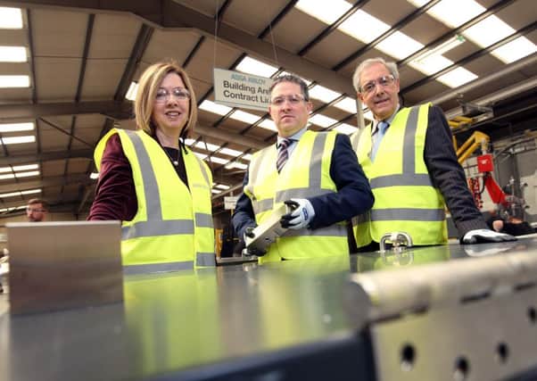 Dr Theresa Donaldson, Chief Executive of Lisburn & Castlereagh City Council; Brian Sofley, Managing Director,  ASSA ABLOY Security Door Group and Councillor Uel Mackin, Chairman of Lisburn & Castlereagh City Council's Development Committee.