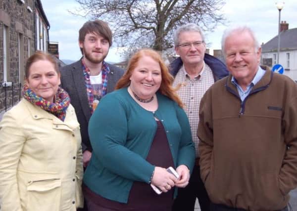 Cllr Aaron McIntyre (back left) on the election trail with Alliance Party colleagues including leader Naomi Long (centre) and Trevor Lunn MLA (right).