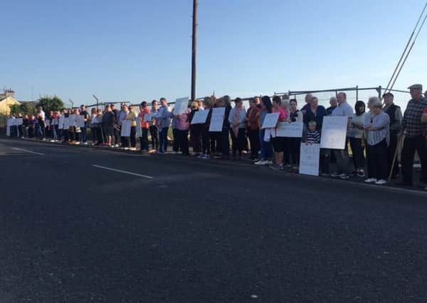 Residents in north Lurgan protest at derelict site of former Clendinings factory