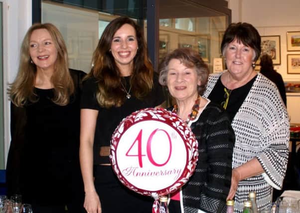 Helen Daniels ,Emily Ford, Doreen Kirkwood and Pearl Patterson celebrate Carrickfergus Art Club's 40th anniversary.
