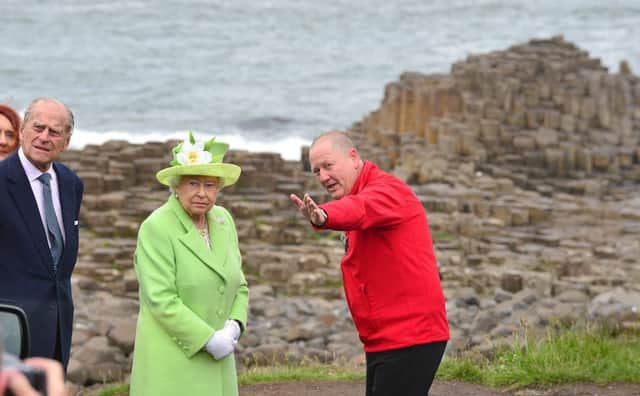 The Queen and the Duke of Edinburgh pictured at the Giant's Causeway with Neville McConchie, National Trust Ranger.
Picture By: Arthur Allison.