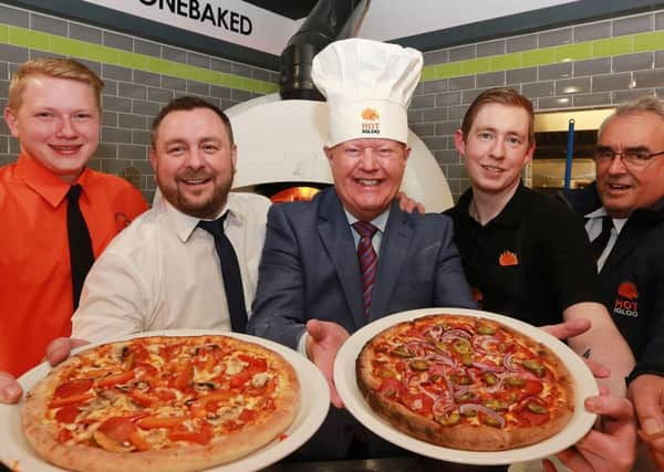 Julian Simmons joins staff at Hot Igloo for the official opening.