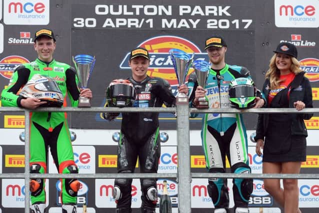 Eglinton rider, David Allingham (2nd) (EHA Racing Yamaha 600), Andrew Irwin (3rd) and overall Championship leader, Tarran Mackenzie, on the podium at Oulton Park, Chesire last Monday.
