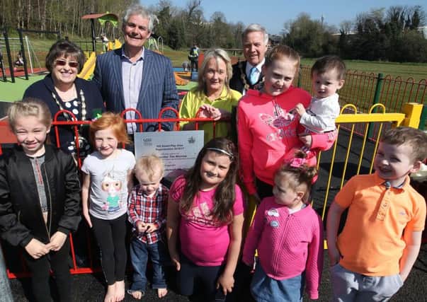 Mayor Brian Bloomfield MBE, Mayoress Rosalind Bloomfield and Chairman of the Leisure & Community Development Committee, Cllr Tim Morrow with residents and children from Hill Street at the reopening of their play park.
