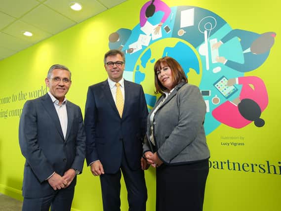 Pearson plc, the worlds learning company, has opened a new Finance Services centre in Belfast. Pictured (L  R) are Gareth Morgan, Pearson, Alastair Hamilton, Invest NI CEO and Suzanne Willmott, Director & Centre Lead - Pearson Finance Services. Photo by Kelvin Boyes / Press Eye.