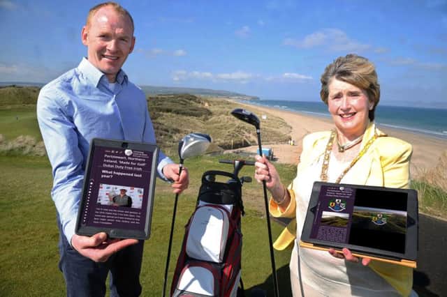 The Mayor of Causeway Coast and Glens Borough Council, Alderman Maura Hickey, pictured with Digital Services Manager Nial McSorley on the golf course at Portstewart for the launch of the interactive guide to the Dubai Duty Free Irish Open. The guide can be accessed using your mobile phone, tablet or desktop device by going to www.causewaycoastandglens.gov.uk