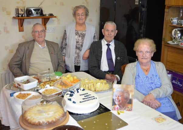 Mr Robert and Emma Gregg (right) from Portadown who recently celebrated their 65th Wedding Anniversary at the family home.  Pictured with the couple are Mr James and Jean Scott from Moneymore, their Best Man and Bridesmaid at the wedding in May 1952.