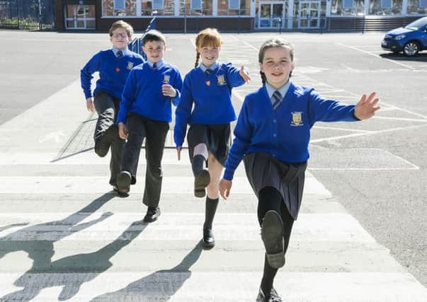 Katie Fennell, Olivia Napier, Keelan Burns and Peter Kelly launch the Travelwise NI Walk to School Week 2017