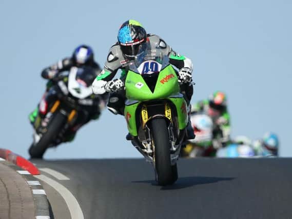 Martin Jessopp leads the Supersport race on Thursday evening at the North West 200.