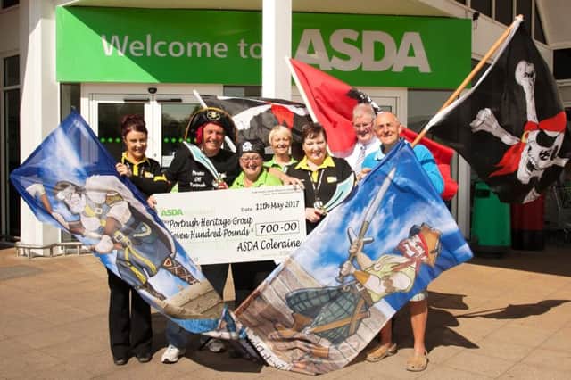 The organisers of the Pirates Off Portrush have received a welcome boost to their fund raising from The ASDA Foundation who have donated Â£700 towards the cost of this year's running of Pirates Off Portrush and Heritage Fair on July 1 and 2. Pictured at the formal cheque hand over are (L to R),
Christina Bradley (ASDA George Department) John Mc Nally ( Chairman PHG) Sheila Palmer ( ASDA Community Champion), Ann Millican (ASDA Kiosk) Edith Gibson (ASDA George Department), James O'Mahoney ( ASDA

Deputy Store Manager), Alan Mc Fadden ( Narrator Pirates Off Portrush Drama).