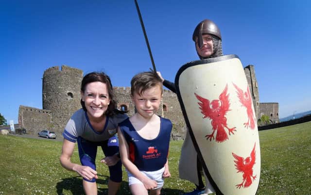 Breege Connolly, 2016 Rio Olympian, at the Storming the Castle launch with Charlie Strudwick from Whitehead and Seapark AC representative Neill Harper (in costume). INCT 20-791-CON