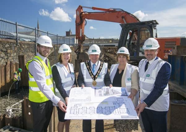 Pictured at the Graham Gardens development are (l-r) Stephen Lowry, Director of Lowry Construction; Council Chief Executive Dr Theresa Donaldson; Mayor Brian Bloomfield MBE; Clanmil Chief Executive Clare McCarty and Michael Rogers of Studio Rogers Architects.
