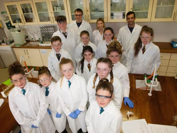 Pupils from Thornhill College, Crana College and St Mary's Limavady pictured with NWRC lecturer Teresa Harris and students Gary Hoad and Marvin Mulhern at the Salters Festival of Chemistry