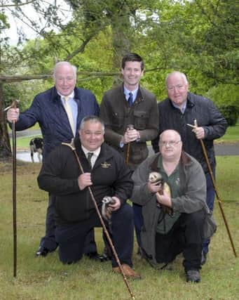 Back from left, Councillor Jim Speers, Jonny Buckley MLA, Councillor Seamus Doyle, Front from left Event Director Derek Lutton, David Downey with Suzie and Romeo the Ferrets.