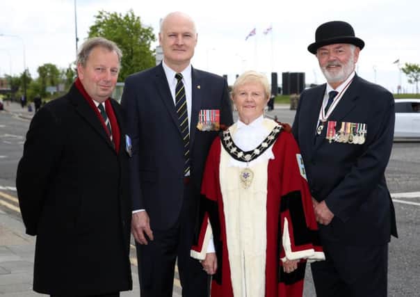 Danny Kinahan, Honorary Colonel of the North Irish Horse, Canadian Defence AttachÃ©, Colonel R Radford CD, Councillor Audrey Wales MBE Mayor of Mid and East Antrim Borough Council and Her Majestys Deputy Lord Lieutenant for the County of Antrim, Dr Norman Walker at the commemoration in Carrickfergus. Picture by Darren Kidd / Press Eye.