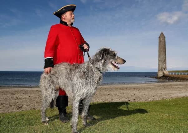 The sun shone for George Logan and his dog Angus at the Friends Goodwill Festival in Larne at the weekend  and this week is set to be a scorcher