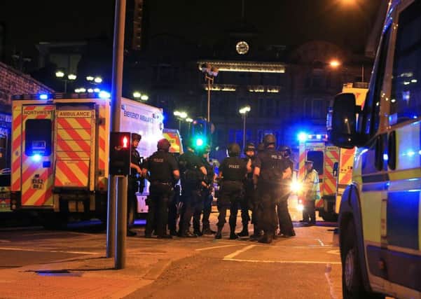 Armed police at Manchester Arena after reports of an explosion at the venue during an Ariana Grande gig. (Peter Byrne/PA Wire)