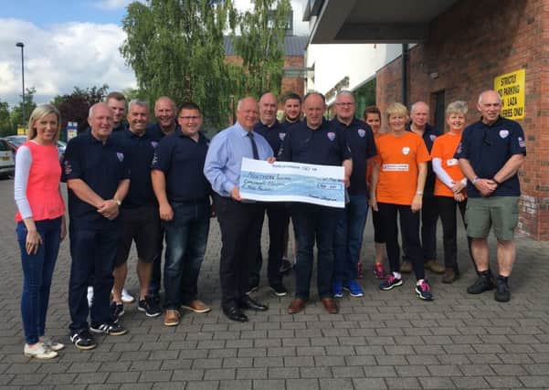 The DUPs David Simpson and MLA Carla Lockhart have congratulated members of Banbridge Orange who recently completed a four peaks challenge.