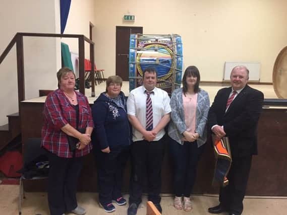 Members of the Swann family following the dedication of the new lambeg drum.