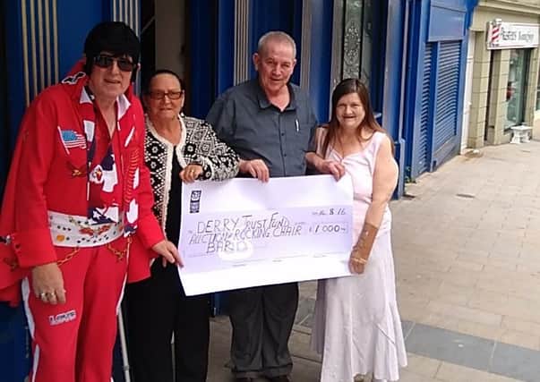 John Dicey OReilly handed over a cheque to Derry Trust Fund last year.