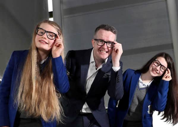 Top illusionist David Meade and Year 9 pupils from St. Killians College Ballymena, Rachel and Ellen, at the launch of the 2018 BT Young Scientist & Technology Exhibition (BTYSTE). Pic: Wiliam Cherry, Presseye