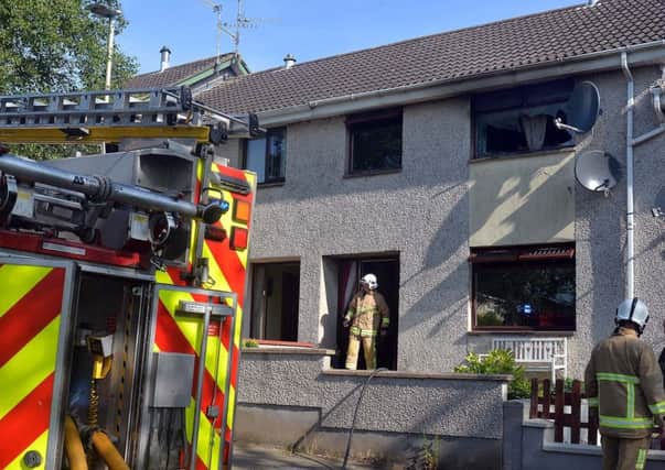 Firefighters at the scene of the house fire in Ballyoran Park.