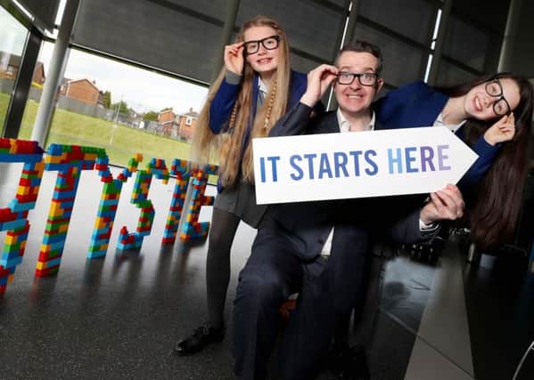 Top illusionist David Meade and Year 9 pupils from St. Killian's College, Carnlough , Rachel McAuley (13) and Ellen Martin (13), at the launch of the 2018 BT Young Scientist and Technology Exhibition (BTYSTE).  Pic by William Cherry Press Eye.
