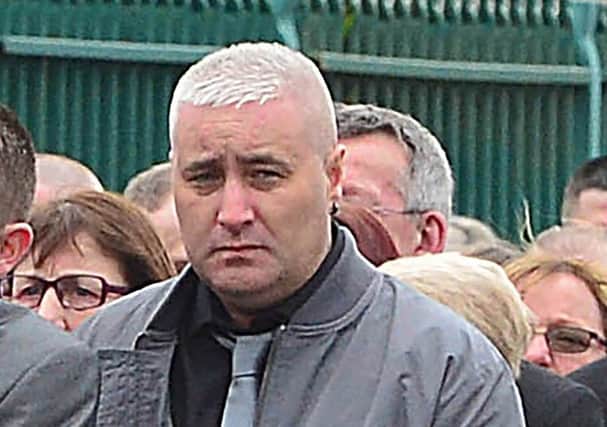 Colin Horner who was shot dead in Bangor yesterday afternoon. He is pictured here at the funeral of loyalist Geordie Gilmore in Carrick in March this year