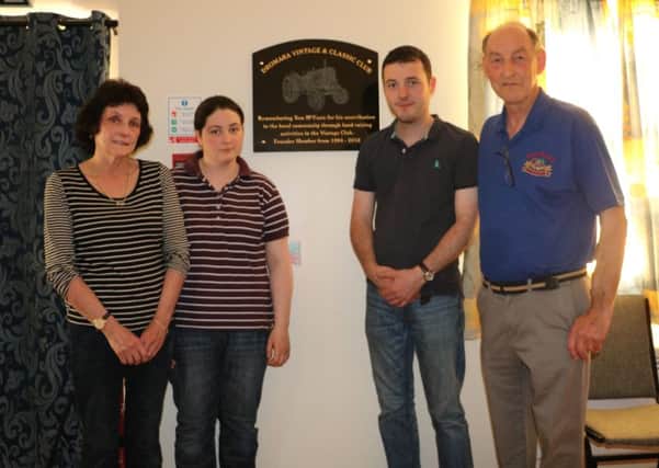 Brian McGrillen, chairman of Dromara Vintage and Classic Club, was joined by Mrs Mary McCann, her daughter Claire and son James at the unveiling of the special plaque in memory of the club's founding chairman, Tom McCann.