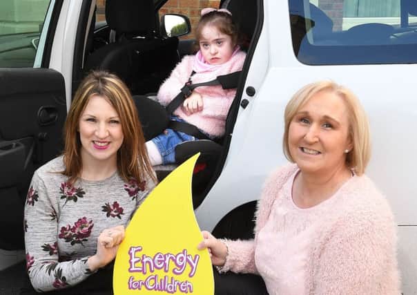 Energy for Children Charity Liaison Officer, Geri Wright (left) with Katie Creegan (9) and her mum, Anne Marie.