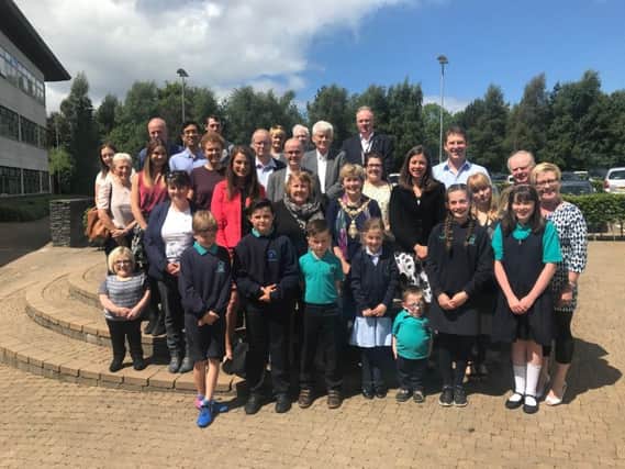 The Mayor of Causeway Coast and Glens Borough Council, Alderman Maura Hickey pictured with teachers and pupils from Mill Strand Integrated Primary School and Nursery Unit. The Mayor held a special reception for the school as it celebrated its 30th anniversary.