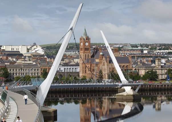 The River Foyle in Londonderry, spanned by the Peace Bridge