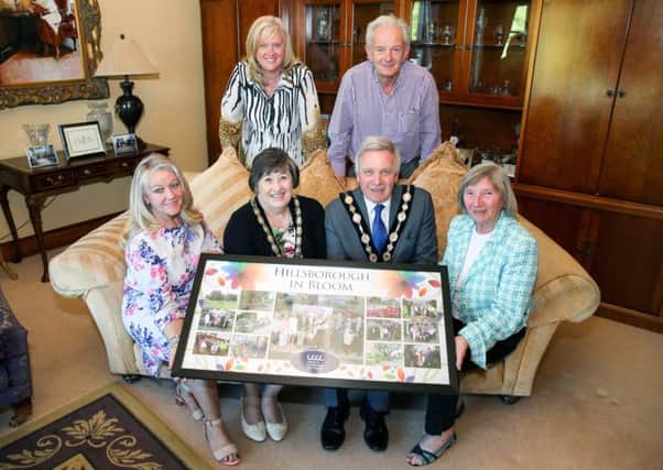 Pictured with the Mayor, Councillor Brian Bloomfield MBE and Mayoress, Mrs Rosalind Bloomfield are (back row) Heather Moore, Director of Environmental Services and Mr Ken McEntee, Hillsborough Community Group.  Front row (l-r) Mrs Dawn McEntee and Nessa O'Callaghan, Hillsborough Community Group.
