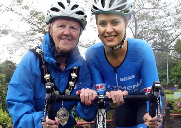 Outgoing Mayor of Mid and East Antrim Borough Council, Cllr Audrey Wales MBE gets ready for Bike Week with Irish international cyclist Eileen Burns.