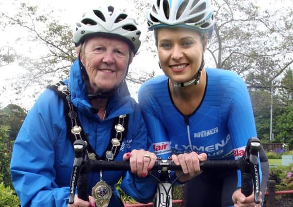 Outgoing Mayor of Mid and East Antrim Borough Council, Cllr Audrey Wales MBE gets ready for Bike Week with Irish international cyclist Eileen Burns. INCT 23-750-CON