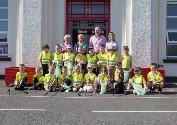 Mayor Audrey Wales with Ruth Orr and Patrick Fisher (both Cullybackey Community Partnership), Sarah Carleton (Eco School Co-Ordinator) and pupils from Buick Memorial.
