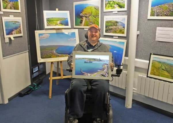 Carrick Library hosts aerial photograph exhibition. Pictured is Peter Steele who captured the special photographs.