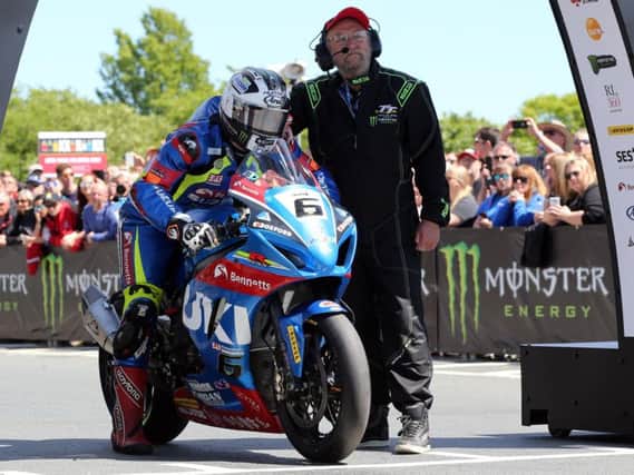 Michael Dunlop pictured at the start of the RST Superbike race on the Bennetts Suzuki.
