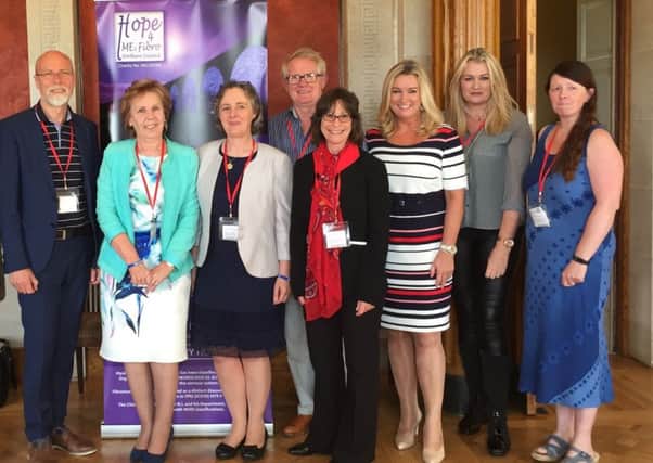 Charity patron Jo-Anne Dobson (third from right) with guest speakers and delegates at the 'Seeking Solutions' conference.