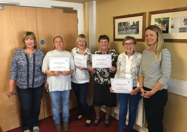 Carers of people with Dementia who completed their six week training course with Alzheimers Society in Broughshane House, Broughshane this week. From left to right they are, Helen Young (Alz Soc Volunteer, Mandy McVey, Marlene OBrien, Margaret Brown, Honor Crawford and Sarah McLaughlin Training Facilitator for Alzheimers Society.